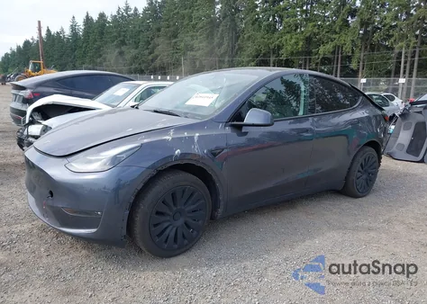 2023 Tesla Model Y z USA, uszkodzony, nr VIN 7SAYGDEE8PF904042